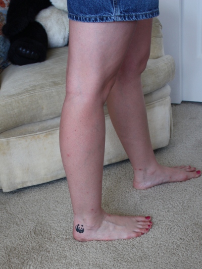 The tattoo is shown below, a small panda on her right ankle.